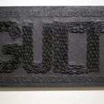 contemporary art, GUILT made with chains on plywood, painted black, by artist Manuel Palacio